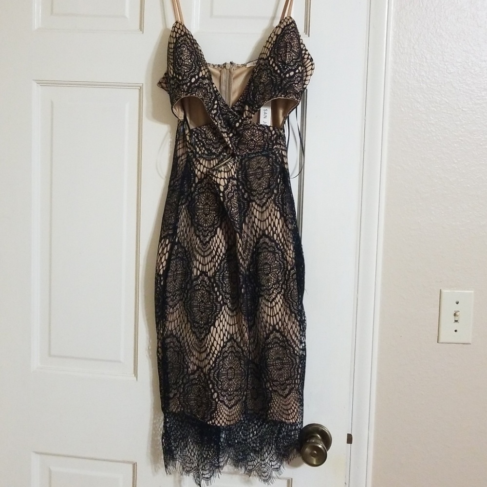 Lace black and nude dress